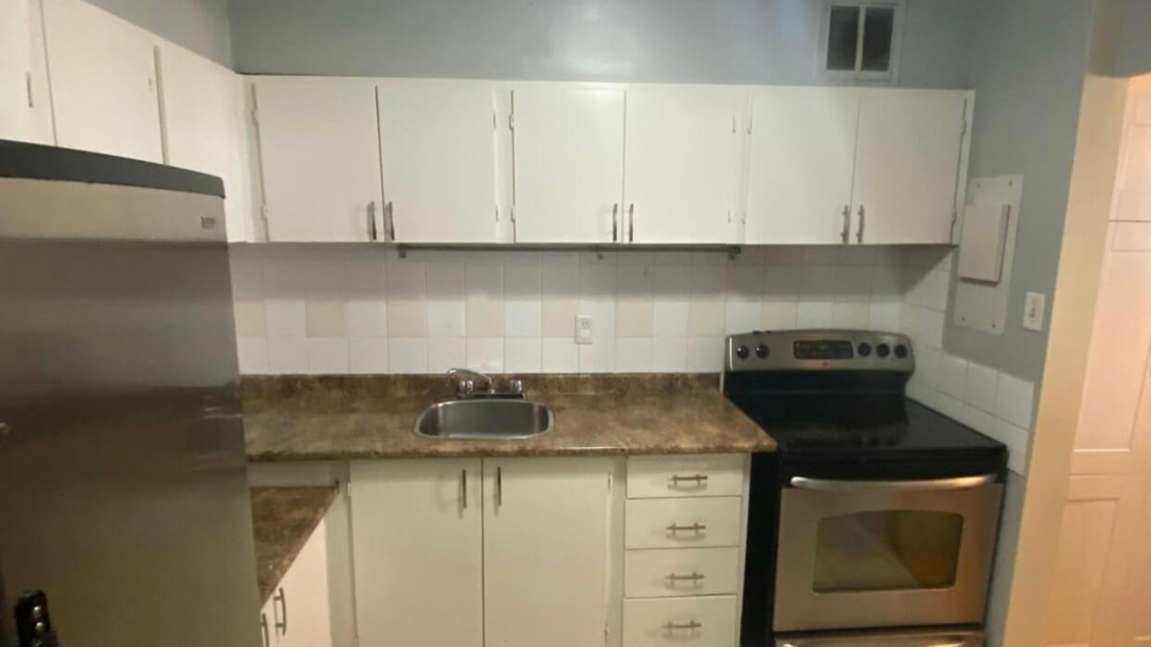 Kitchen cabinet color trends 2025 showing white navy gray and green options